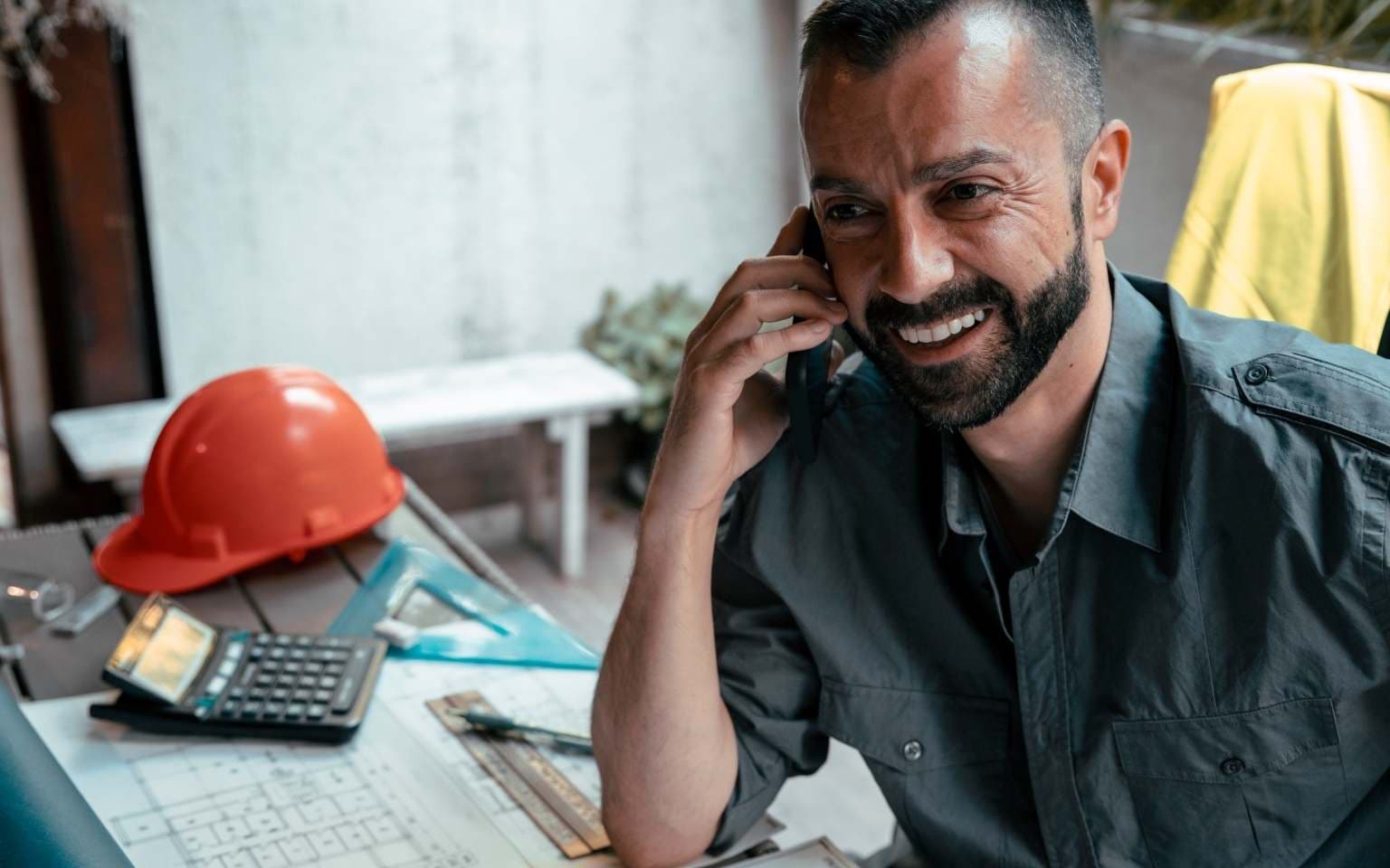 home service professional speaking in phone