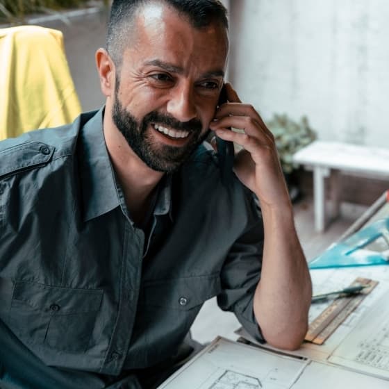 contractor answering his client call